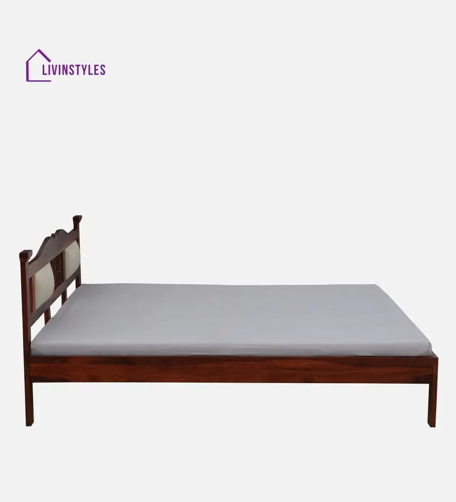 Naman Sheesham Wood Queen Size Bed In Honey ak Finish With Padded Headrest