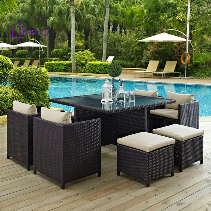 Sagar 7 Piece Outdoor Wicker Dining Set With Ottoman And Table (Dark Brown & Cream)