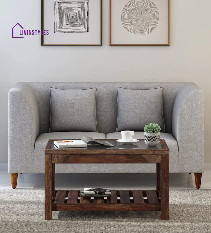 Stigen Sheesham Wood Coffee Table In Provincial Teak Finish With Glass Top